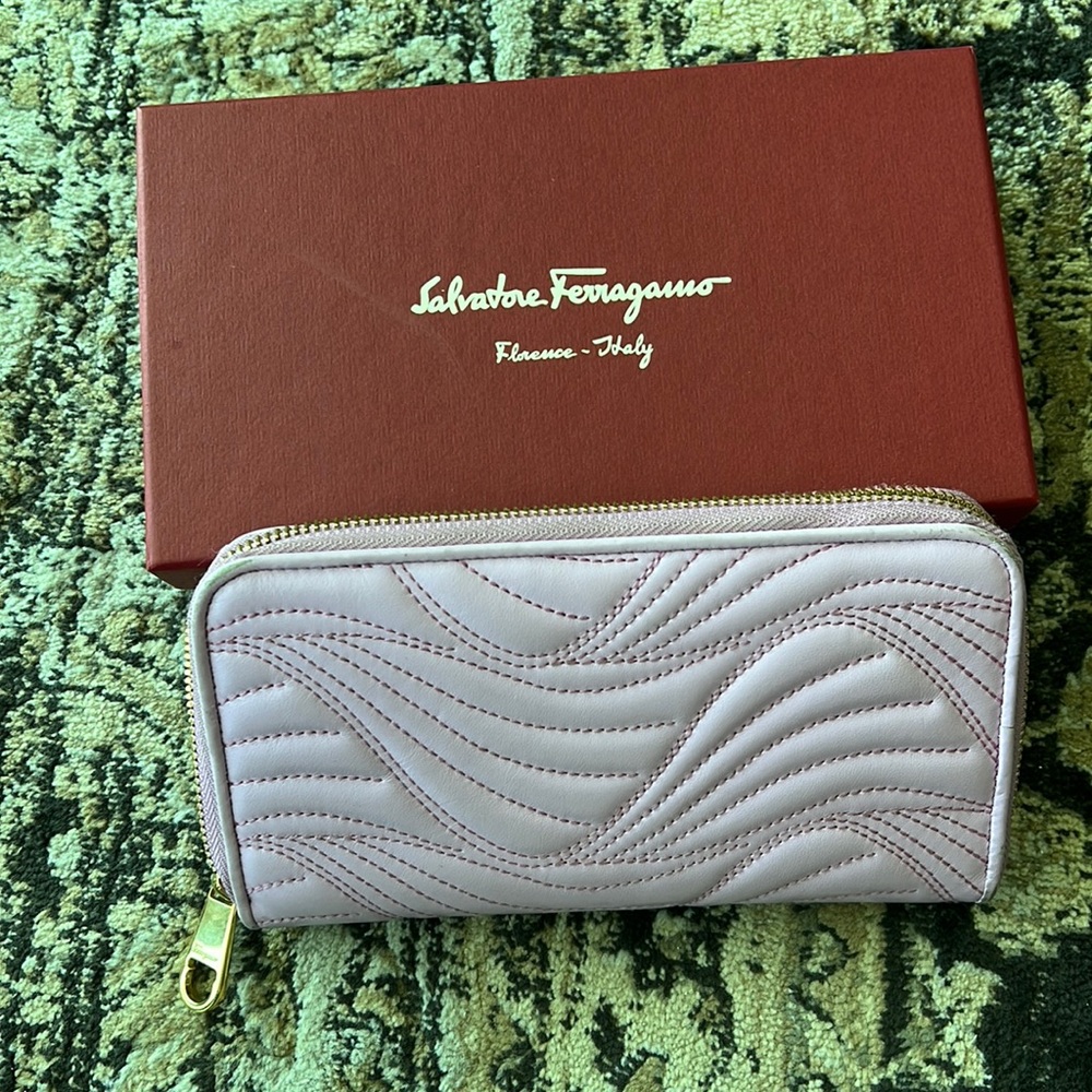 Salvatore Ferragamo pink with gold accent leather zipper stitch wallet